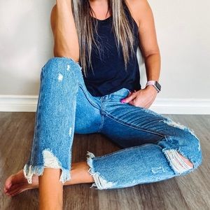 Distressed boy friend denim